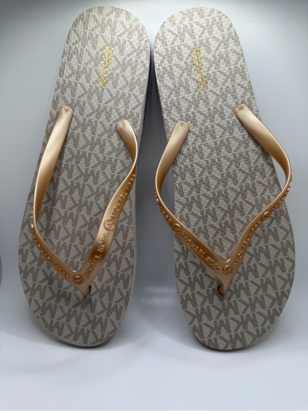 Michael Kors Beige Logo-Print Flip Flops with Metallic Gold Straps